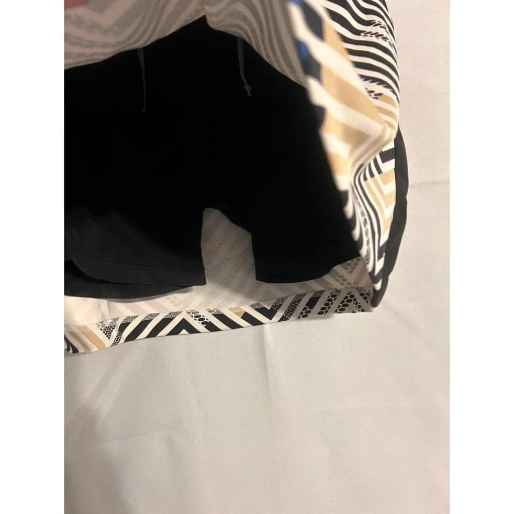Tall brand tennis/pickleball skort like new XS‎ w pockets floral pleaded